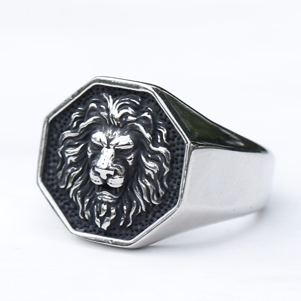 Side profile of the vintage-style stainless steel lion ring, showing the sturdy band.