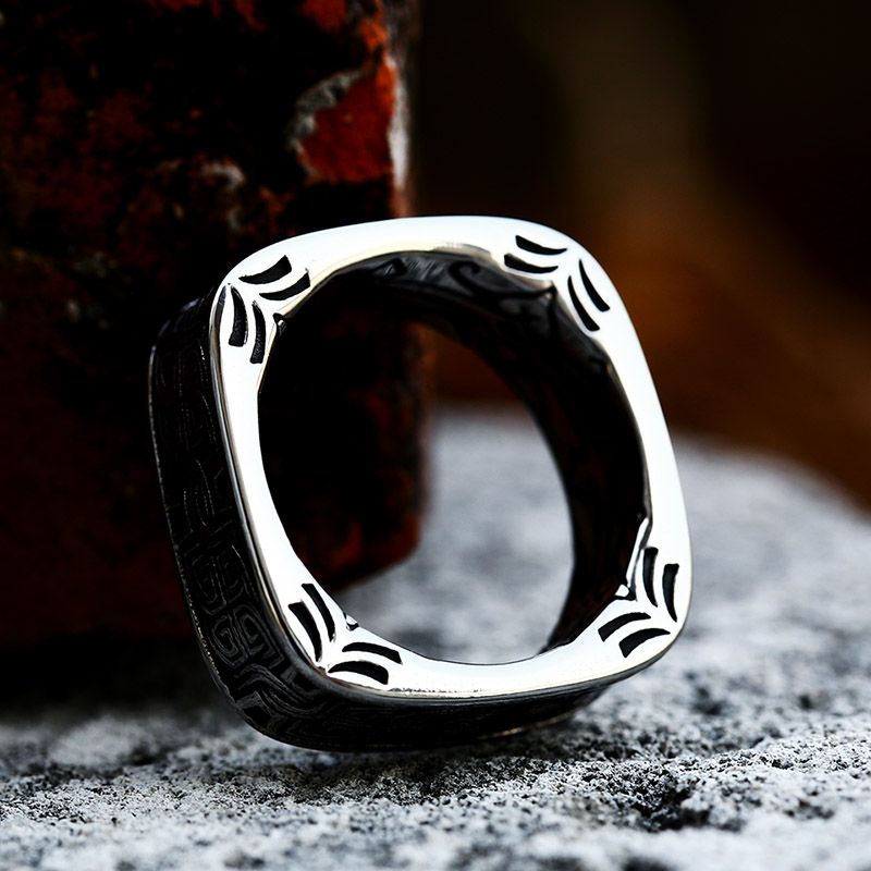 Full view of the distinctive square shape and intricate Celtic knot details on the ring.