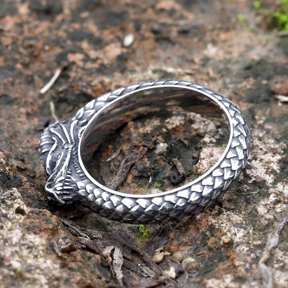 Close-up of the Nordic dragon ring's head and scaly textured band.