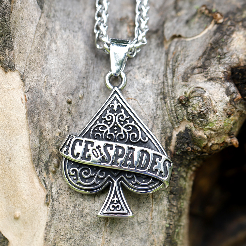 Silver-tone Ace of Spades punk pendant featuring ornate scrollwork and chain