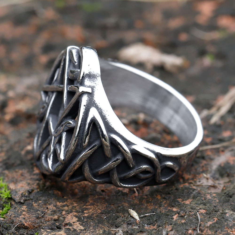 Close-up of the intricate Celtic knot details surrounding the pentagram on the ring.