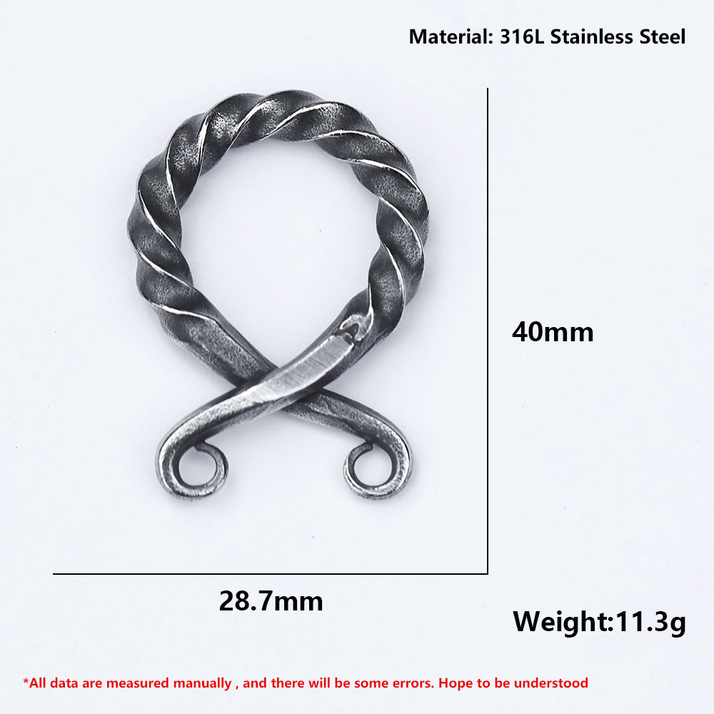 Close-up detail of the twisted metal design on the Viking amulet pendant