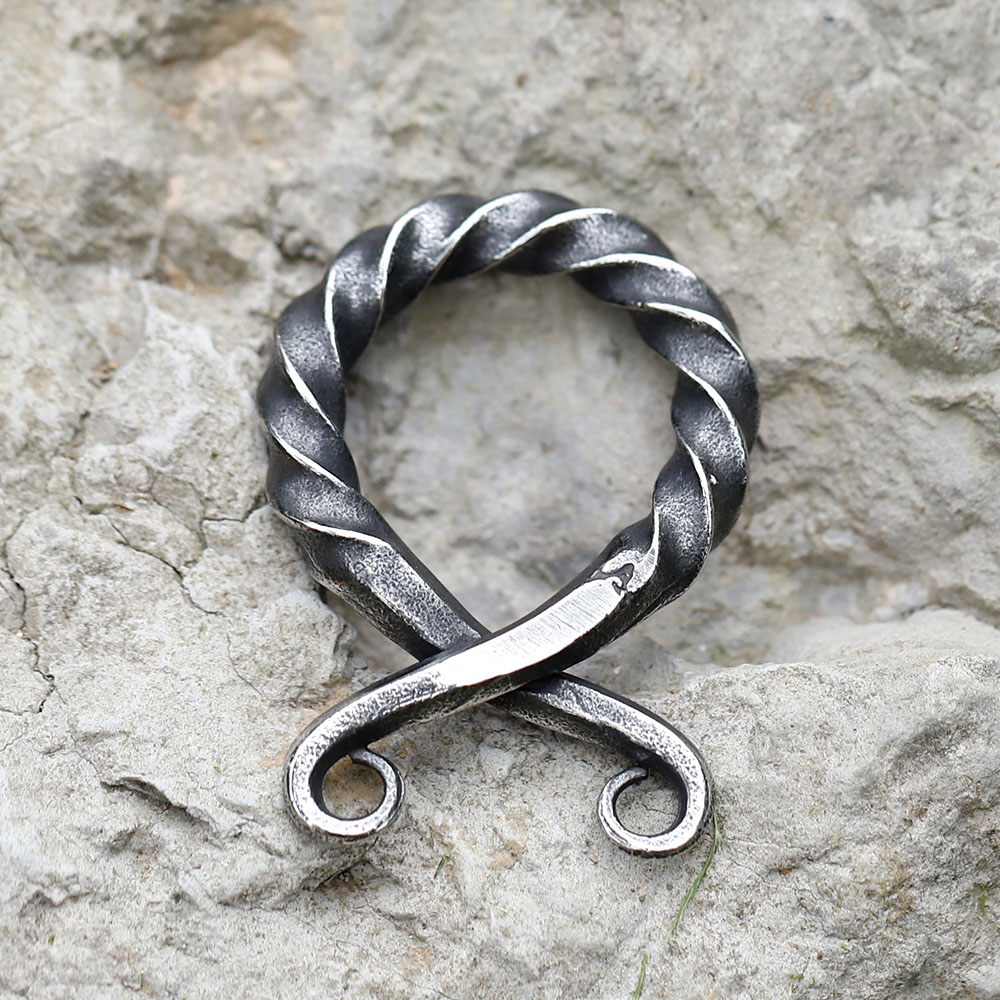 316L stainless steel vintage Norse Viking amulet pendant on a rugged stone surface