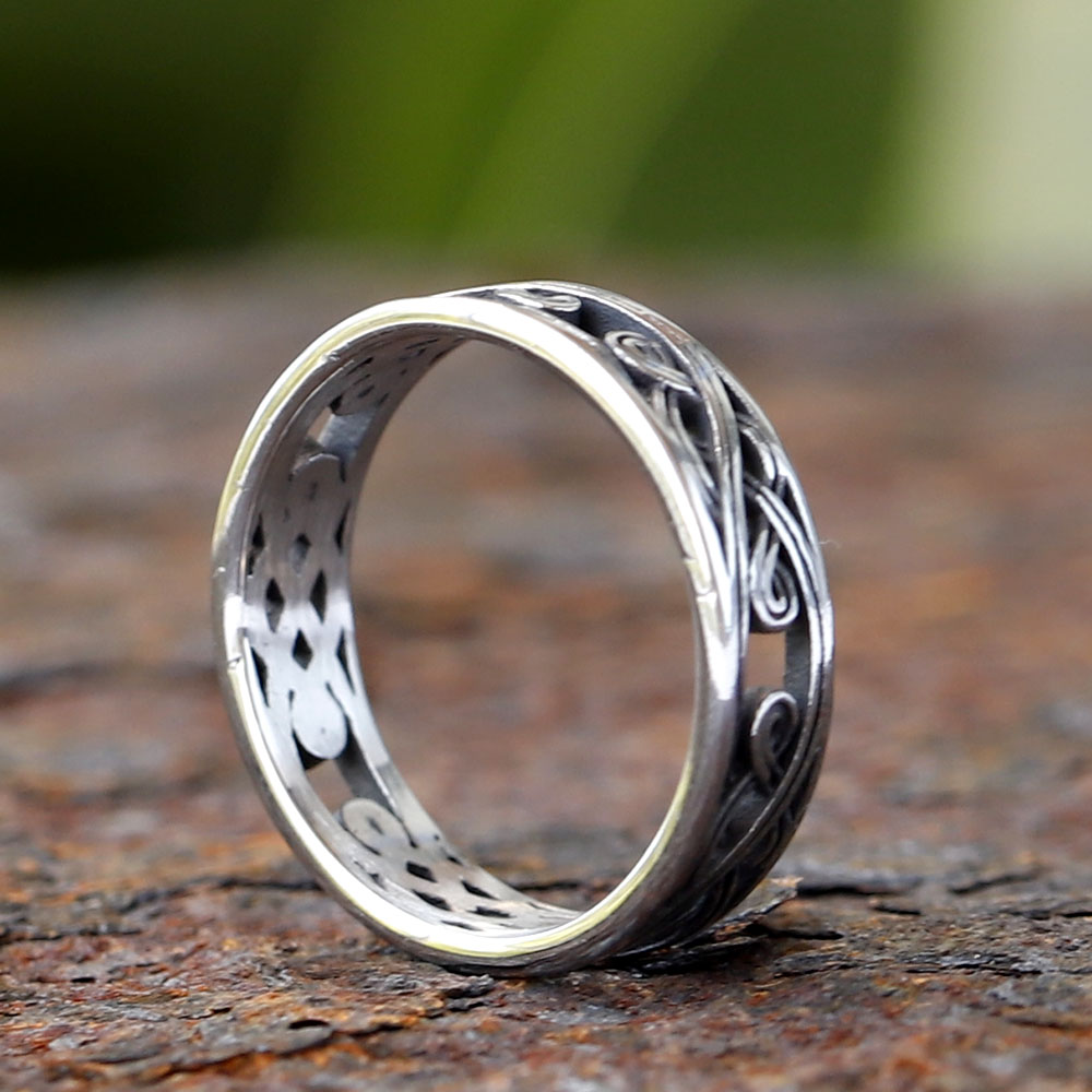 Durable Nordic-style stainless steel ring featuring a vintage openwork design
