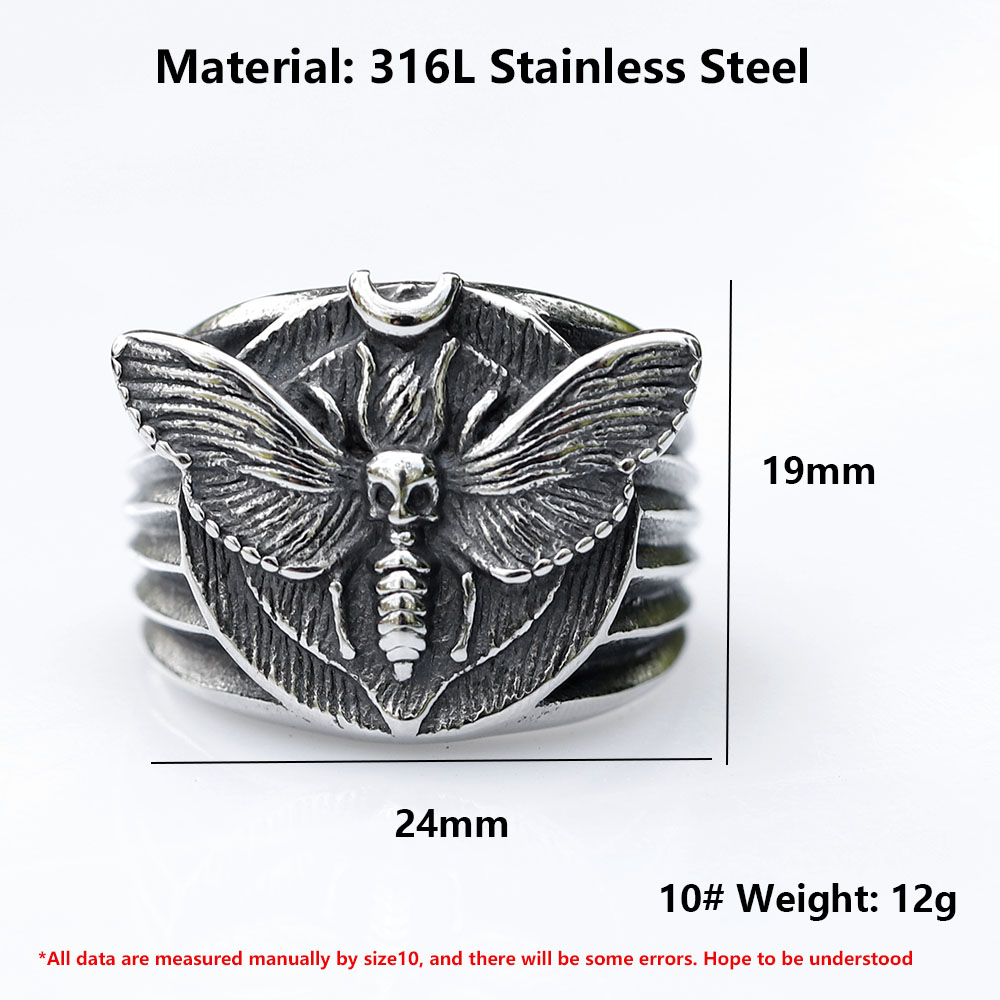 Angled view showcasing the shiny finish of the men's stainless steel skull moth ring.