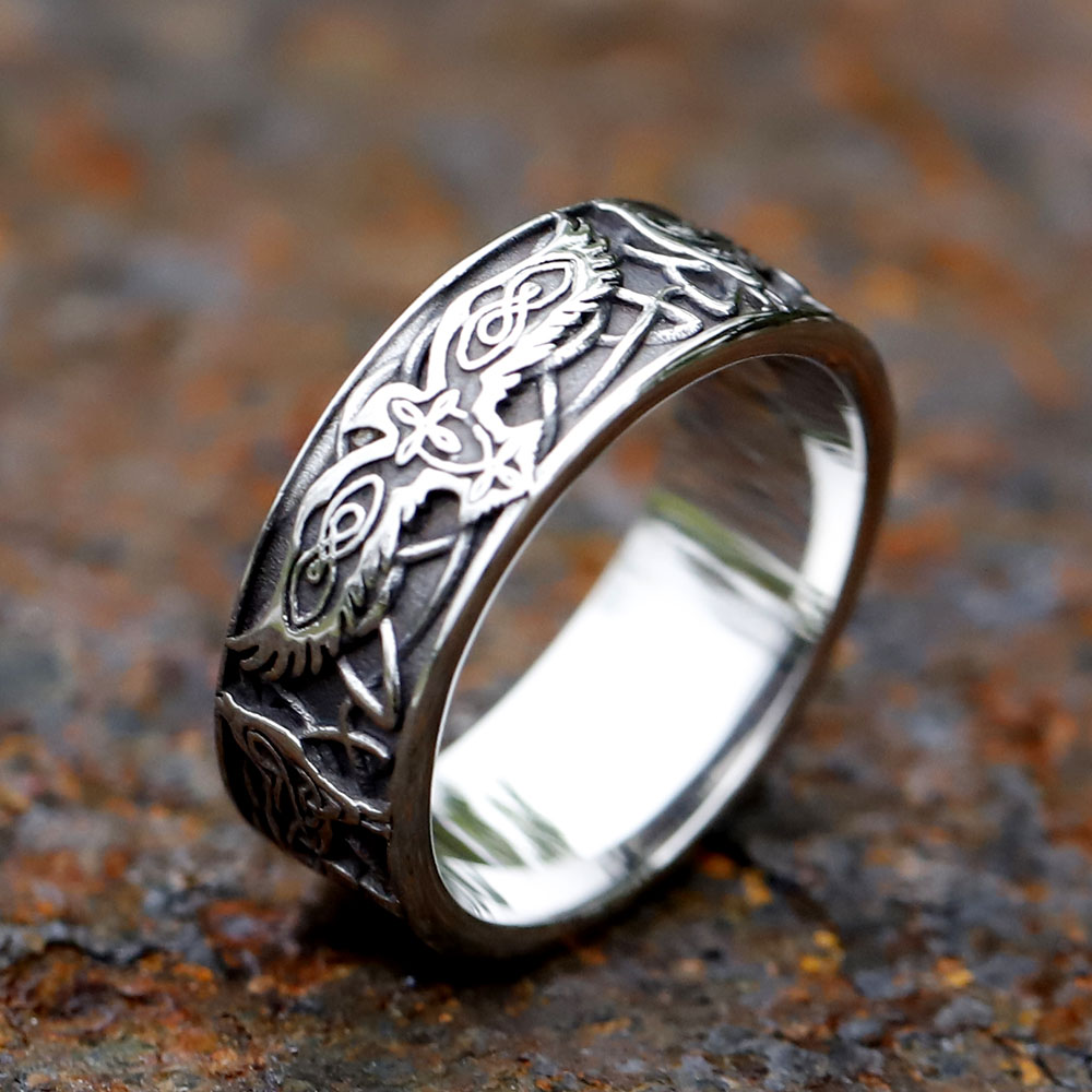 Side view of the stainless steel ring, displaying the full intricate Nordic eagle and knotwork pattern