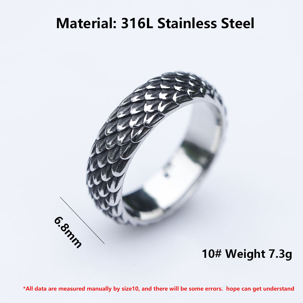 Profile view of the rugged men's dragon ring with a shiny inner band.