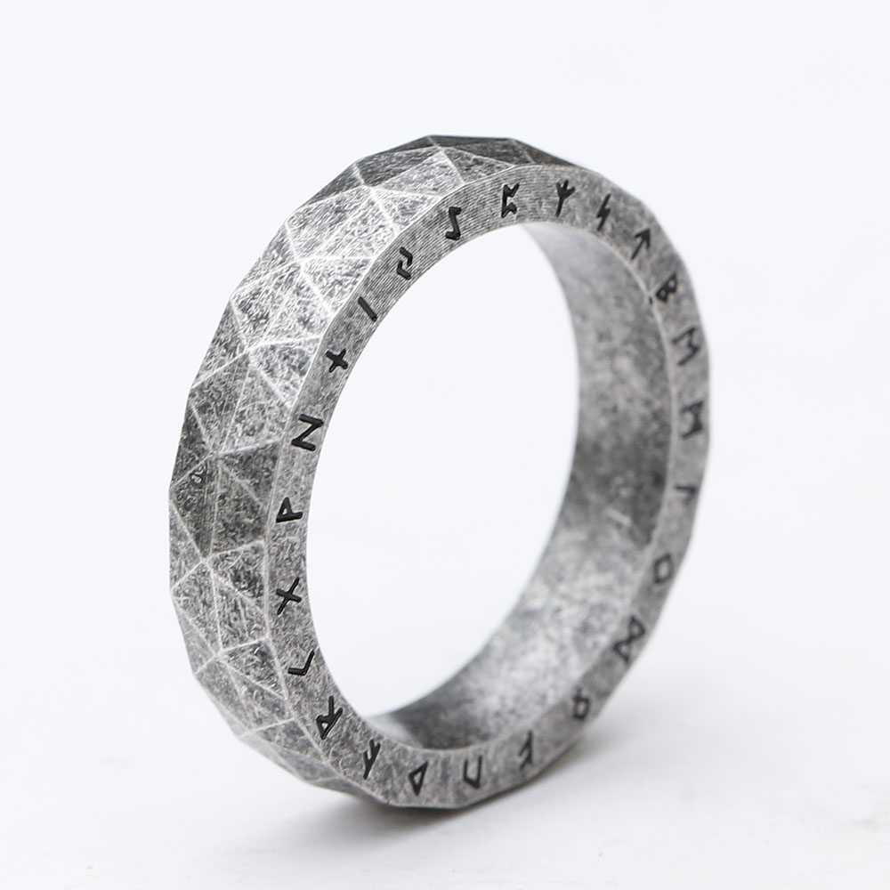 Silver-toned stainless steel Viking rune ring with a unique faceted, geometric texture.