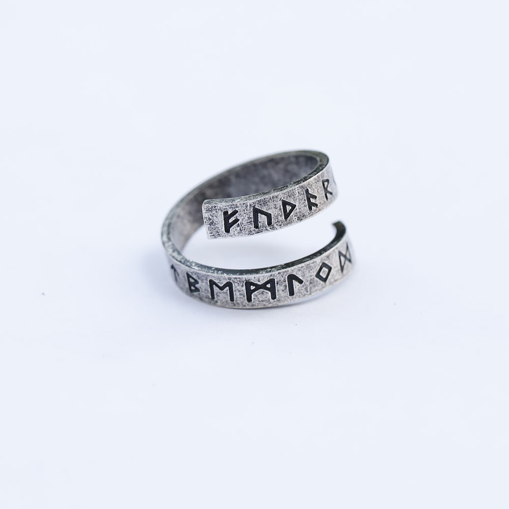 Lifestyle shot of the Viking rune ring on a man's hand, illustrating its fit and style.
