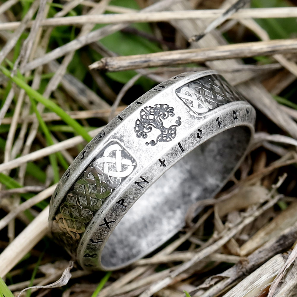 Close-up on the upper side of the vintage Viking ring, highlighting the detailed Tree of Life symbol.