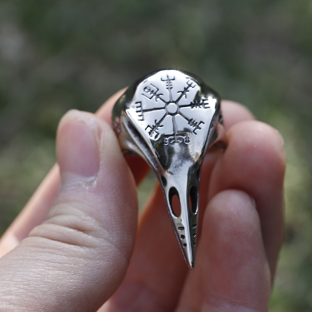 Full profile view of the polished 316L stainless steel raven head ring with a Vegvisir design.